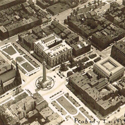 Sepia toned aerial photo of Mt. Vernon including George Washington Monument and Peabody Institute.